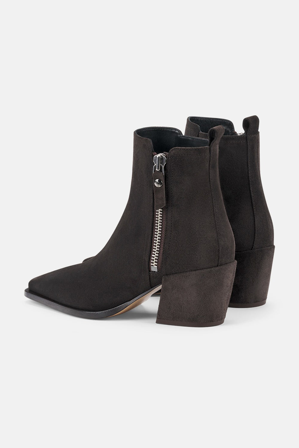 Pair of brown ankle boots with a zipper on a white background