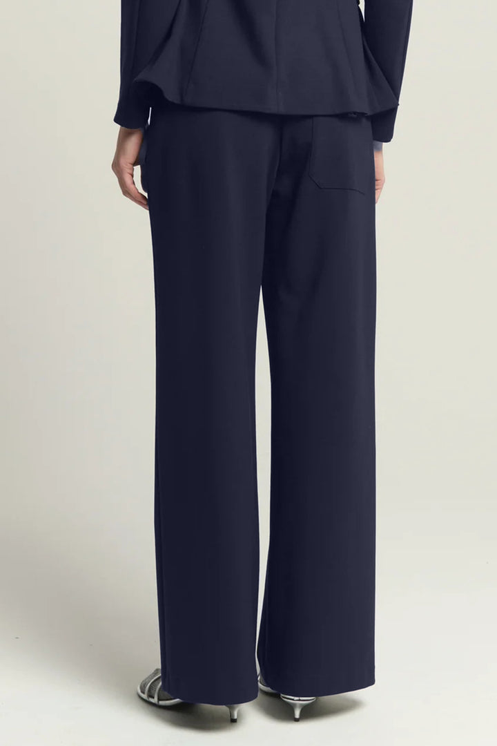 Beatrice B Dark Blue Wide Leg Trousers 1147, back view showing the patch pocket and hem break