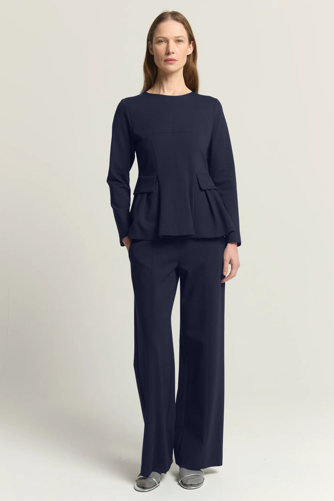 Beatrice B Dark Blue Wide Leg Trousers 1147, full length front view styled with the matching navy peplum top
