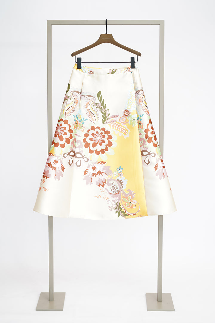 Floral A-line skirt on a hanger against a white background
