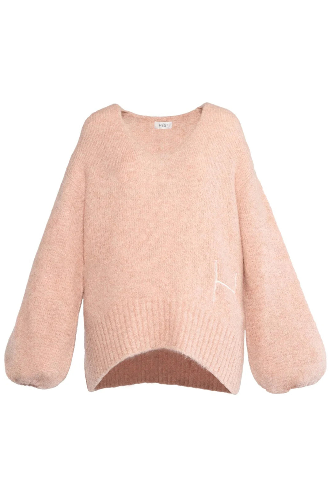 Pink sweater on a white background
