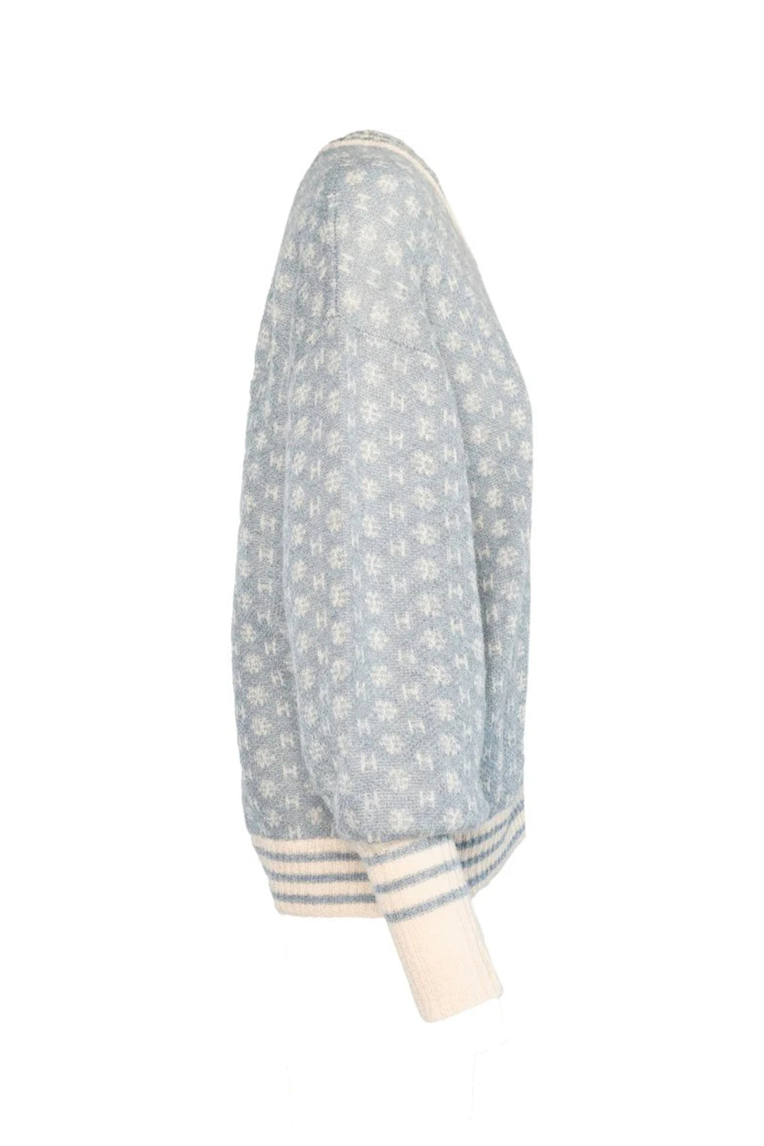 Light blue patterned sweater with white cuffs on a white background