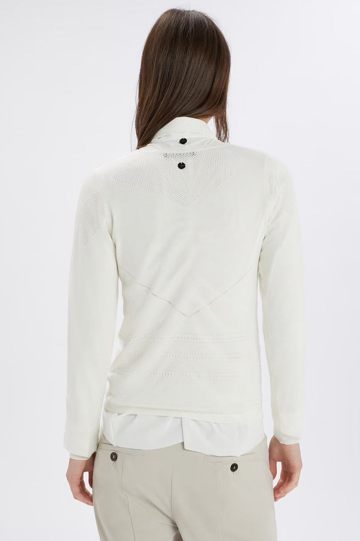 Woman wearing a white jacket on a white background