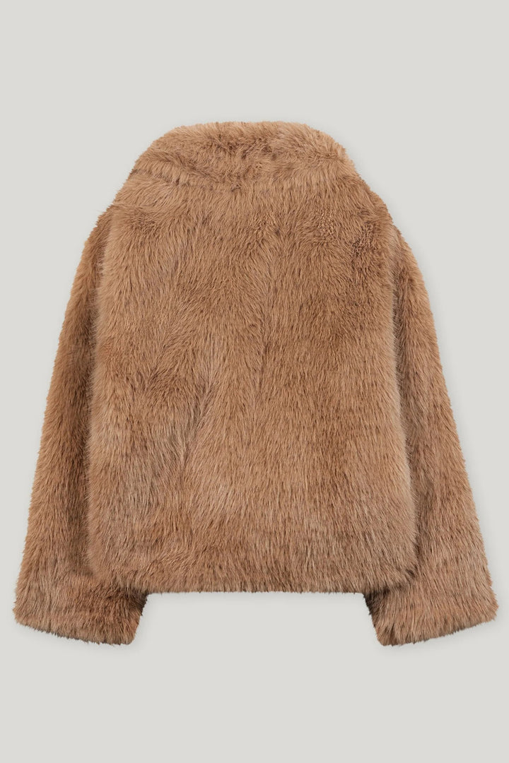 Brown fluffy jacket on a light gray background