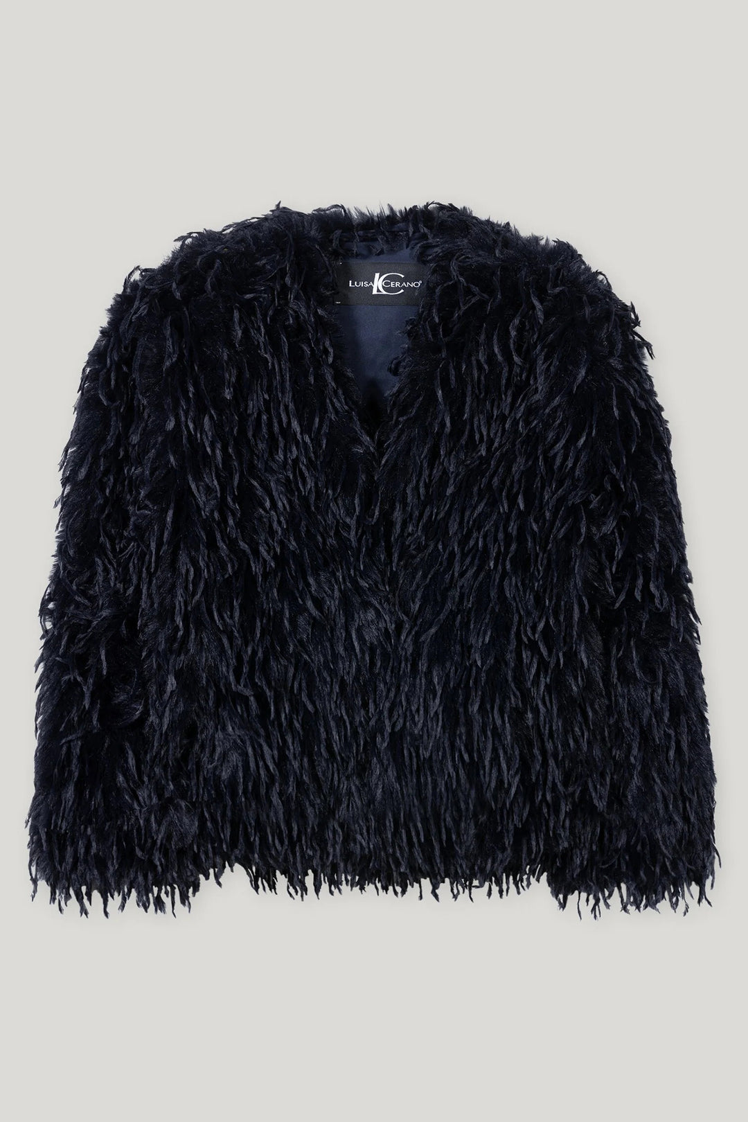 Navy fluffy jacket on a light gray background