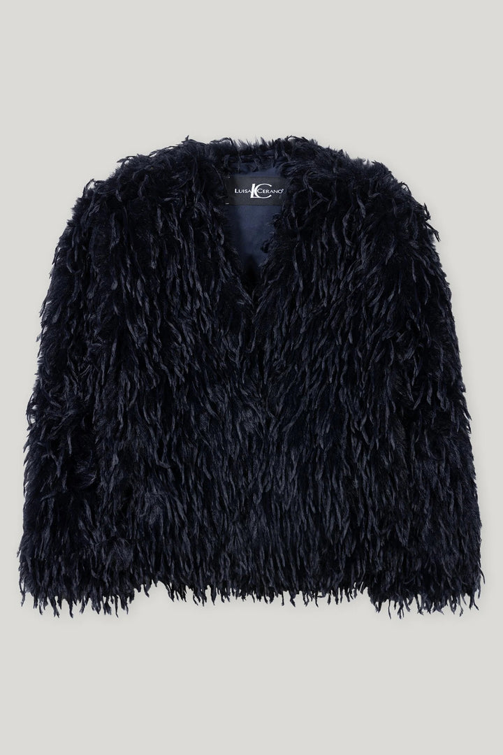 Navy fluffy jacket on a light gray background