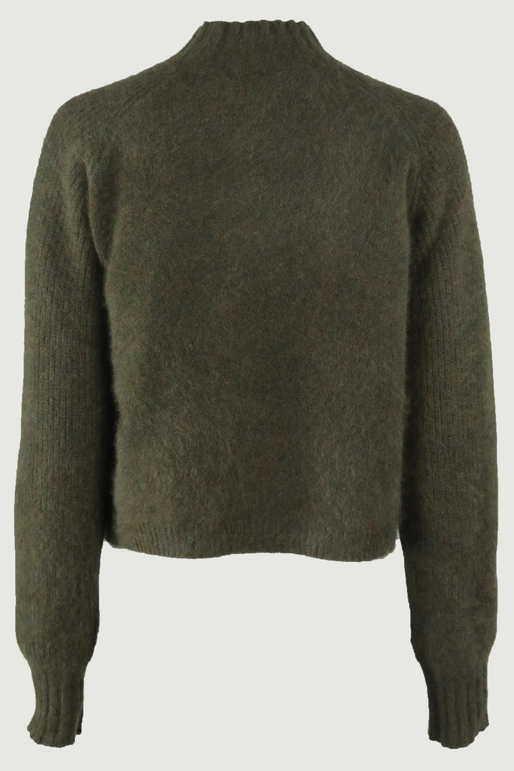 Green sweater on a white background