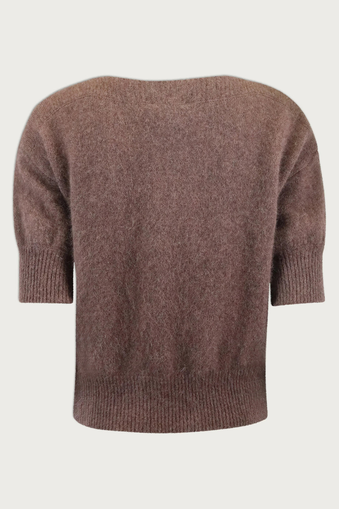 Brown knitted sweater on a light gray background