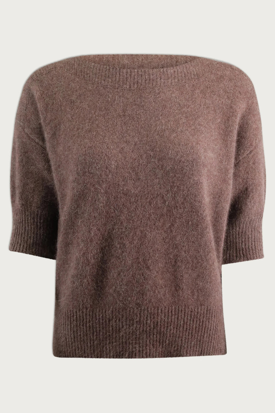 Brown knitted sweater on a light gray background