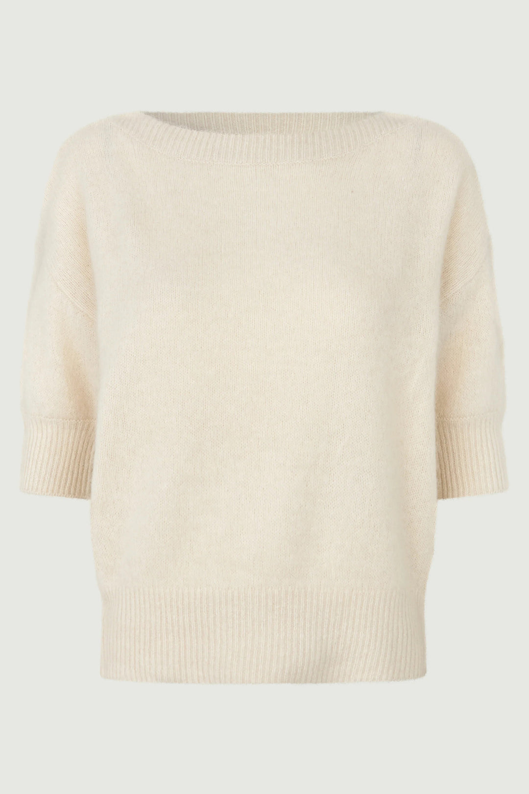 Beige sweater on a light gray background