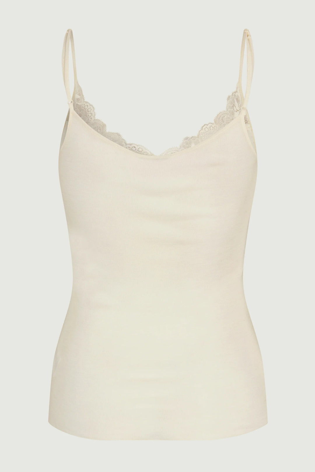 Beige camisole with lace trim on a light gray background