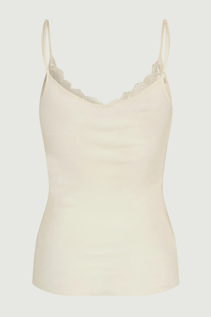 Beige camisole with lace trim on a light gray background
